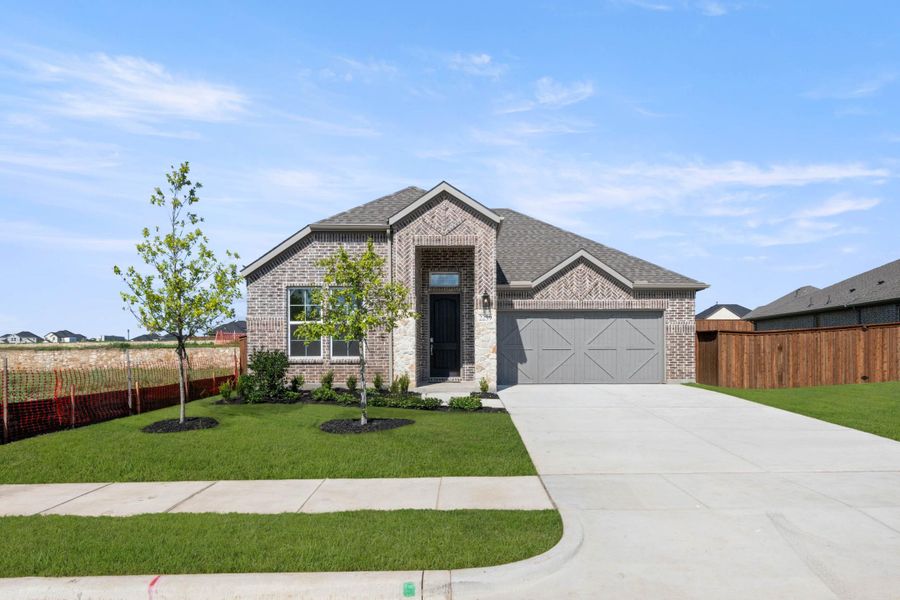 Front exterior of a home in the View at the Reserve 50s community, located in Mansfield, TX (Image 5).