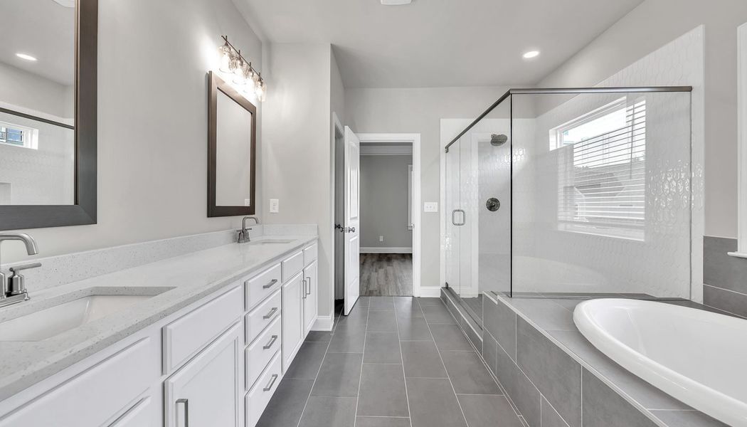 Furnished interior in a model home at Traditions of Braselton in Jefferson (Image 34).