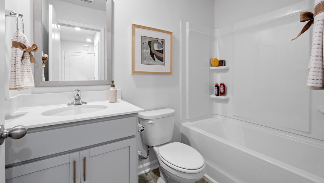 Furnished interior in a model home at Tanglewood Townes in Greenville (Image 17).