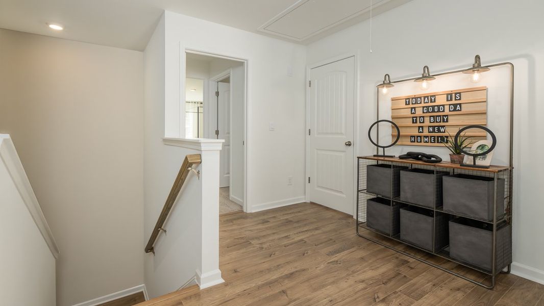 Furnished interior in a model home at Rosewood Farms in Acworth (Image 30).
