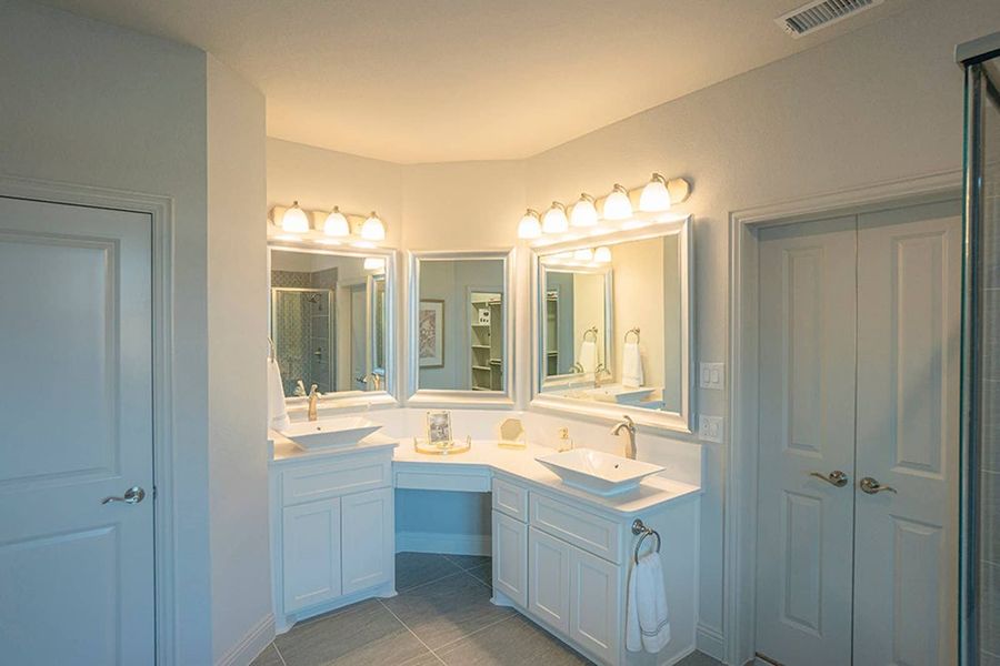 Furnished interior in a model home at Woodcreek in Fate (Image 18).