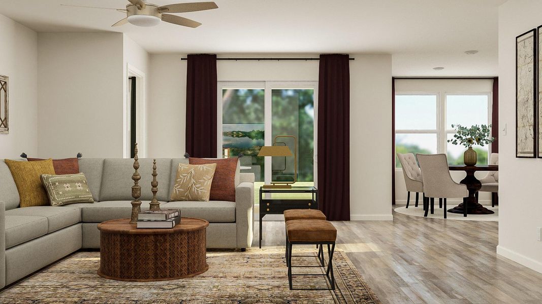 A living room with a couch and chairs. A living room with a couch and chairs.