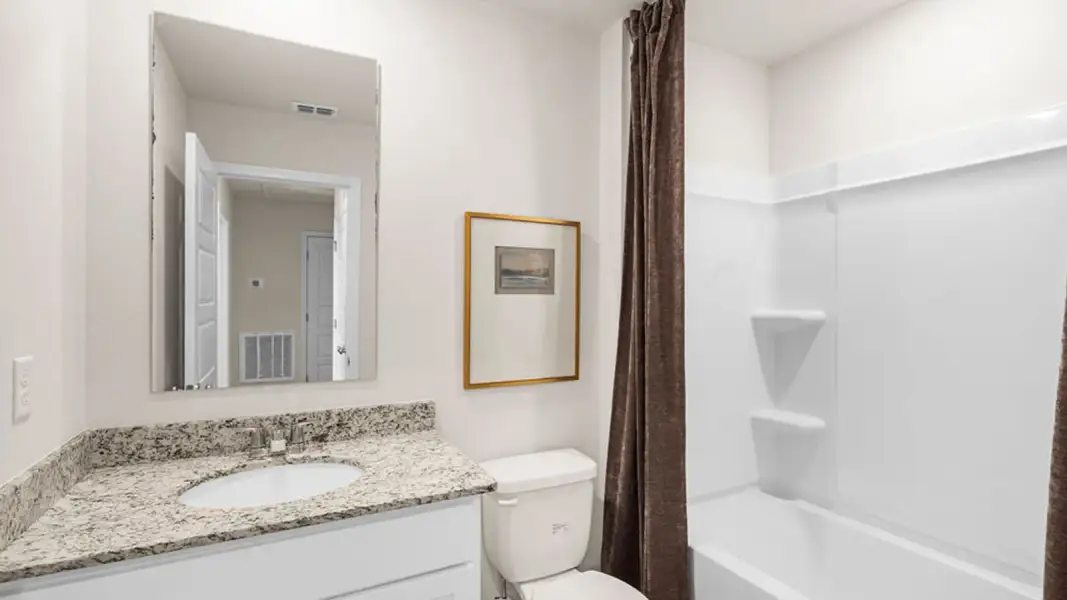 Furnished interior in a model home at Abilene Acres in Tallahassee (Image 24).