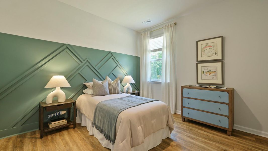 Furnished interior in a model home at Pineview North in Summerville (Image 18).