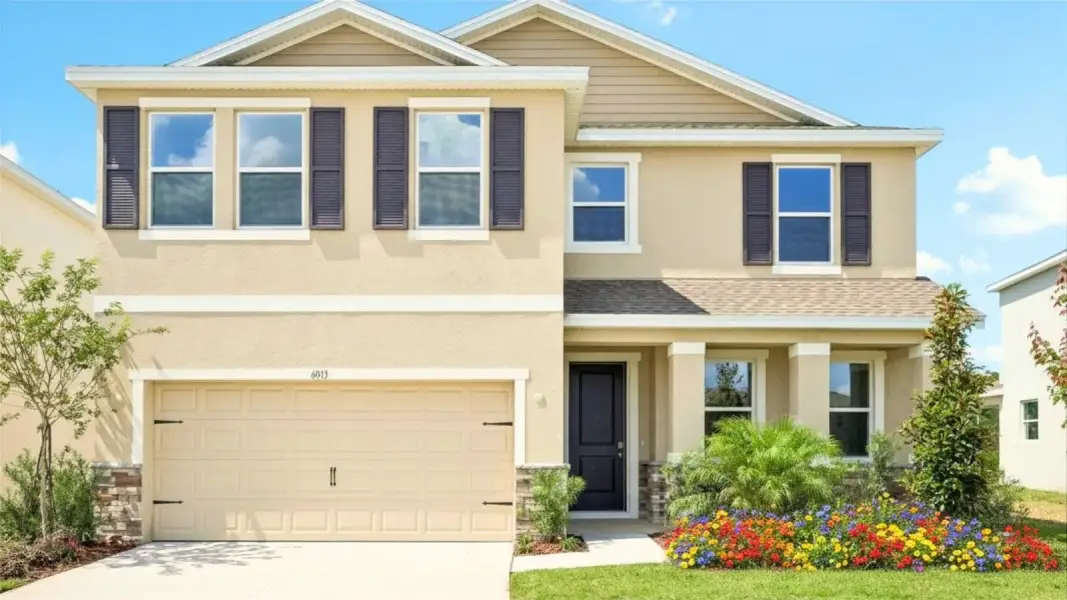 Front exterior of a home in the Pasadena Ridge community, located in Dade City, FL (Image 3).