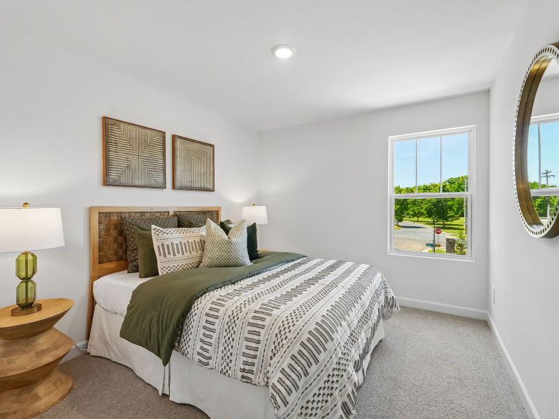 Furnished interior in a model home at Rocky River Towns in Charlotte (Image 15).