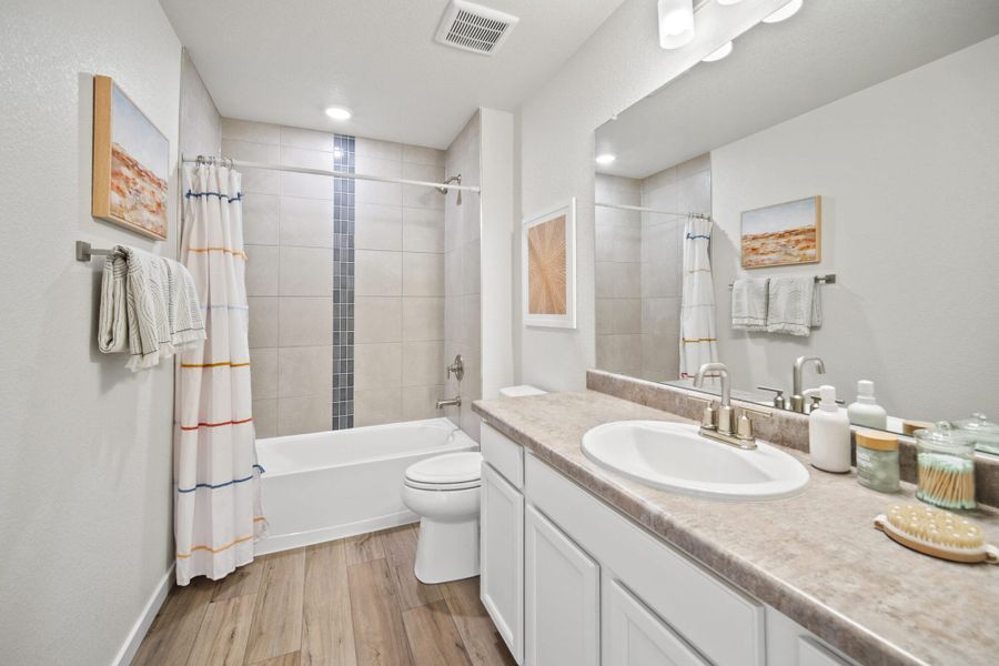 Furnished interior in a model home at The Glen in Colorado Springs (Image 21).