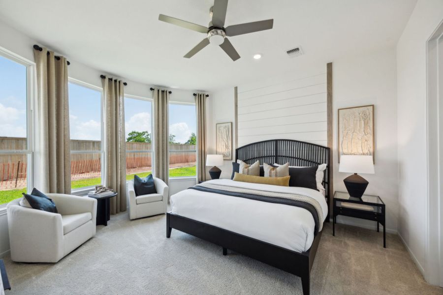 Furnished interior in a model home at Windcress in Cove (Image 13).