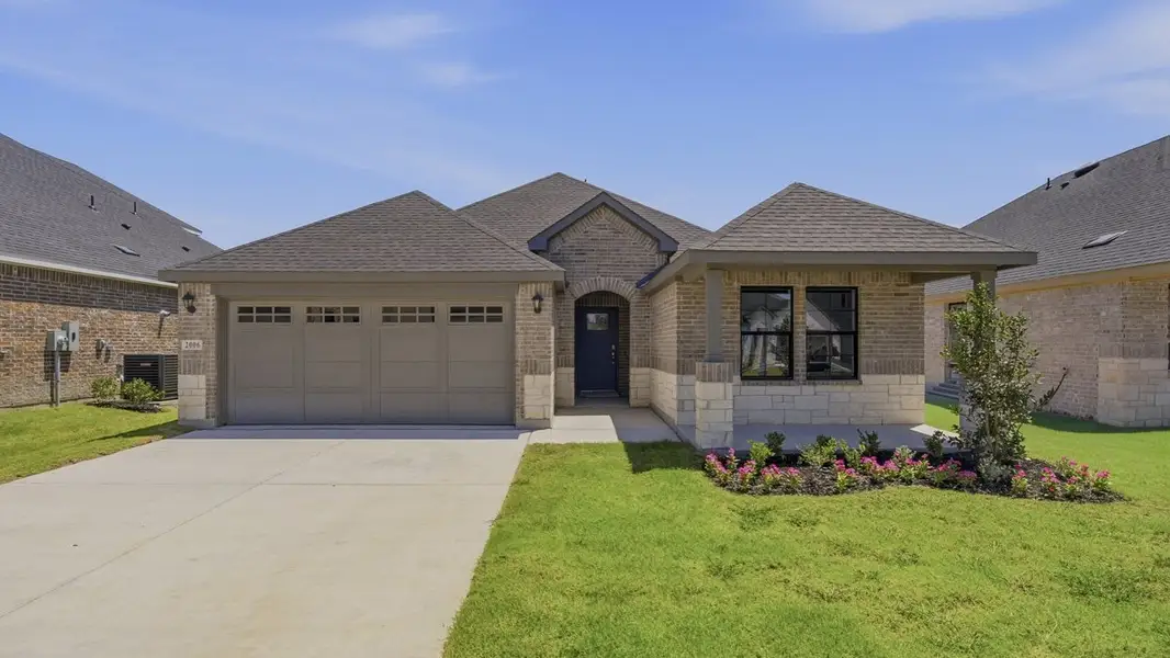 Front exterior of a home in the Windchime community, located in Celina, TX (Image 3). Front exterior of a home in the Windchime community, located in Celina, TX (Image 3).