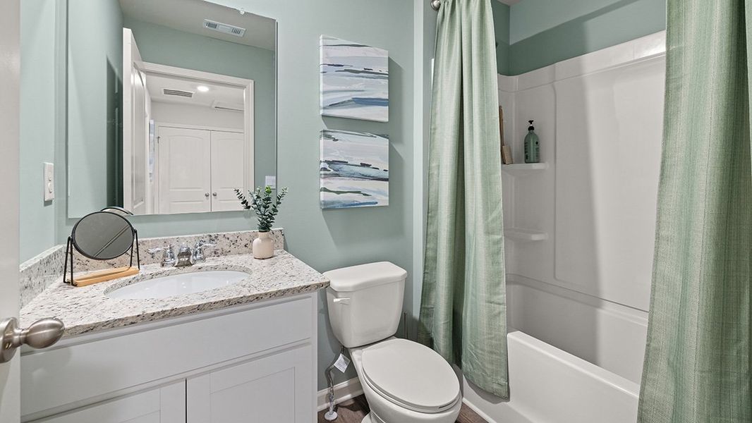 Furnished interior in a model home at Old Summerville Village in Rome (Image 18).