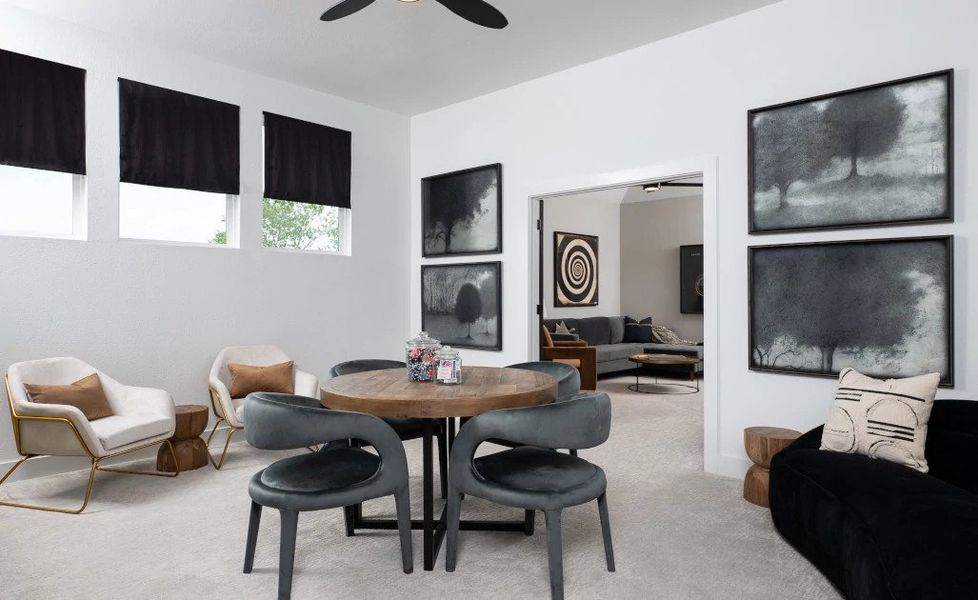 Furnished interior in a model home at The Trails at Carmel 60s in Pflugerville (Image 9).