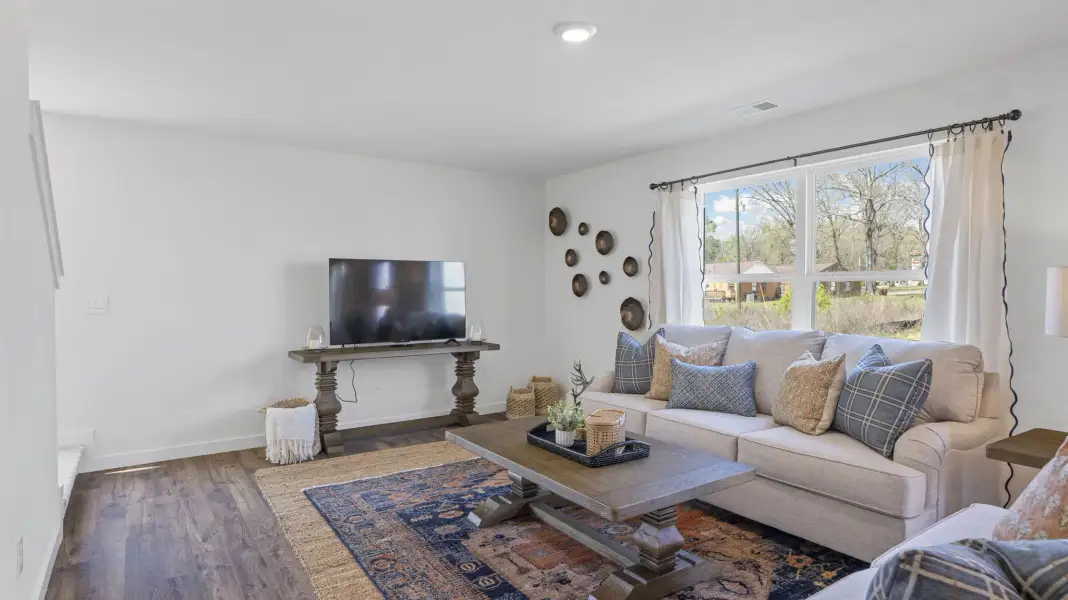 Furnished interior in a model home at Holloway Farms in Cleveland (Image 15).