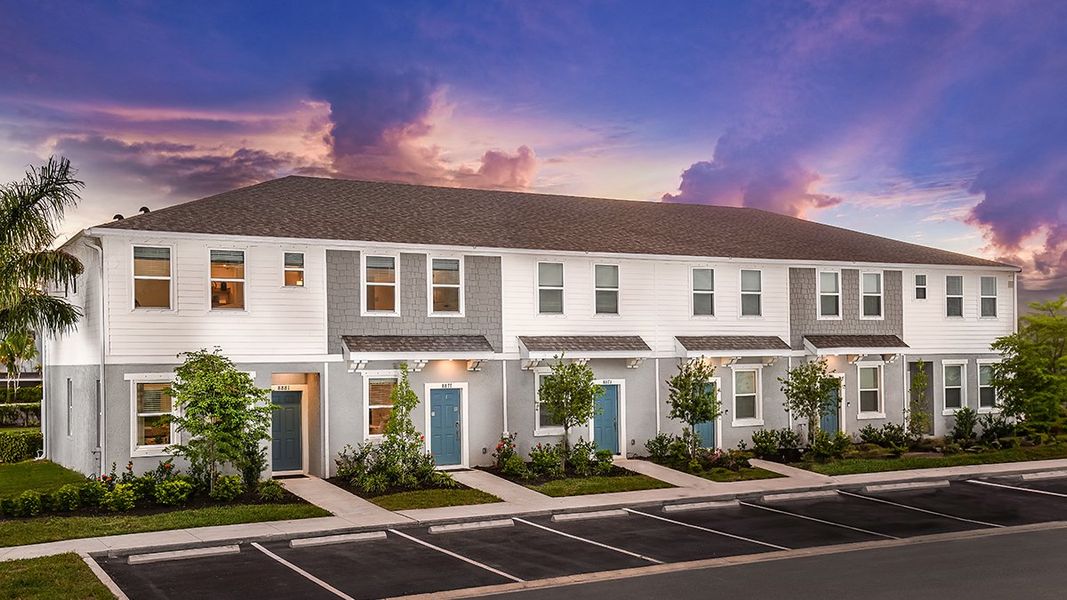 Front exterior of a home in the The Townhomes at Skye Ranch community, located in Sarasota, FL (Image 16).