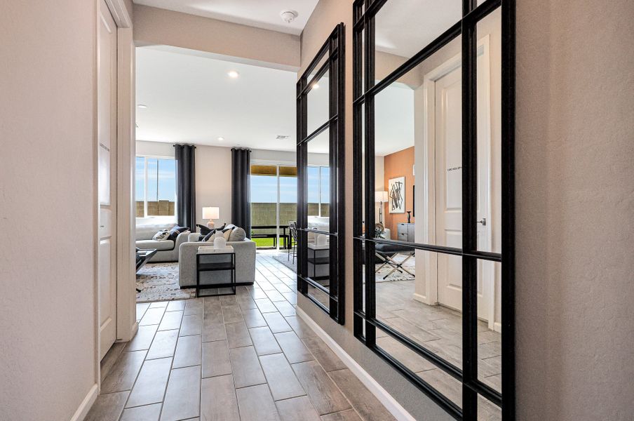 A hallway with glass doors. A hallway with glass doors.