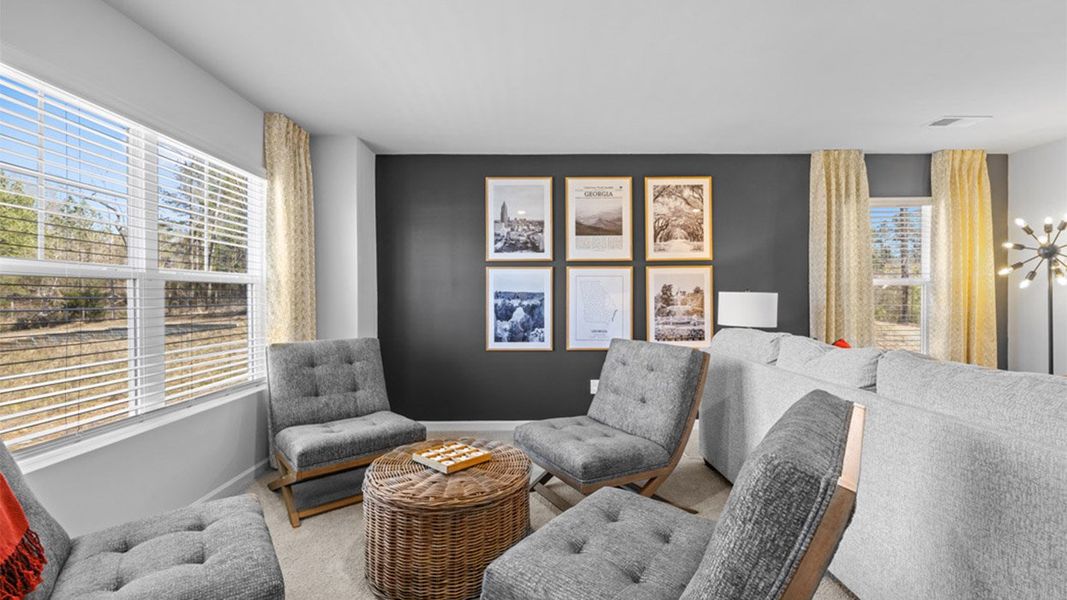 Furnished interior in a model home at Garden Lakes in Hampton (Image 11).