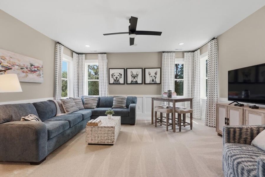 Furnished interior in a model home at Rock Creek in Denver (Image 46).