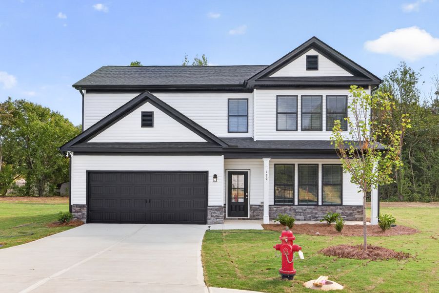Front exterior of a home in the Robins Estates community, located in Warner Robins, GA (Image 16). Front exterior of a home in the Robins Estates community, located in Warner Robins, GA (Image 16).
