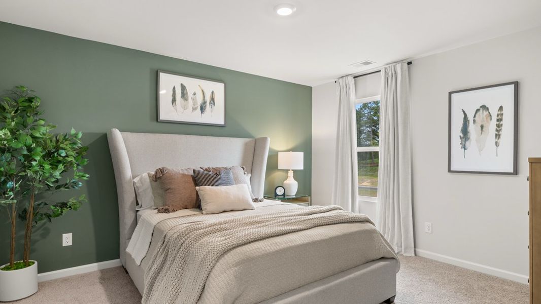 Furnished interior in a model home at Fairway 17 at Mirror Lake in Villa Rica (Image 42).