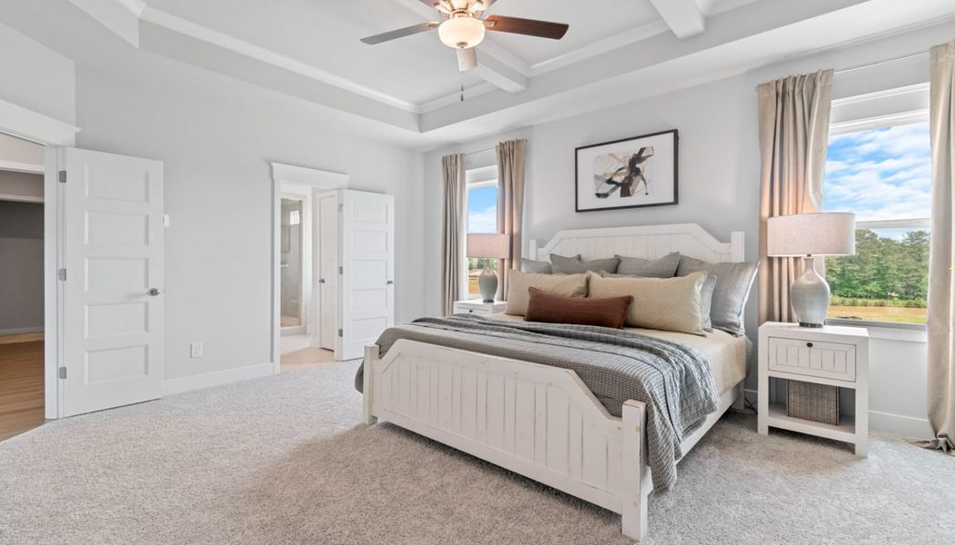 Furnished interior in a model home at Summerlin in Winder (Image 56).