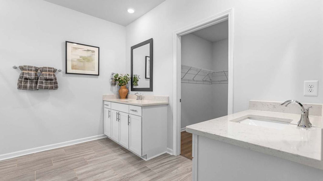 Furnished interior in a model home at Quarry Hills - Freedom in Swepsonville (Image 4).