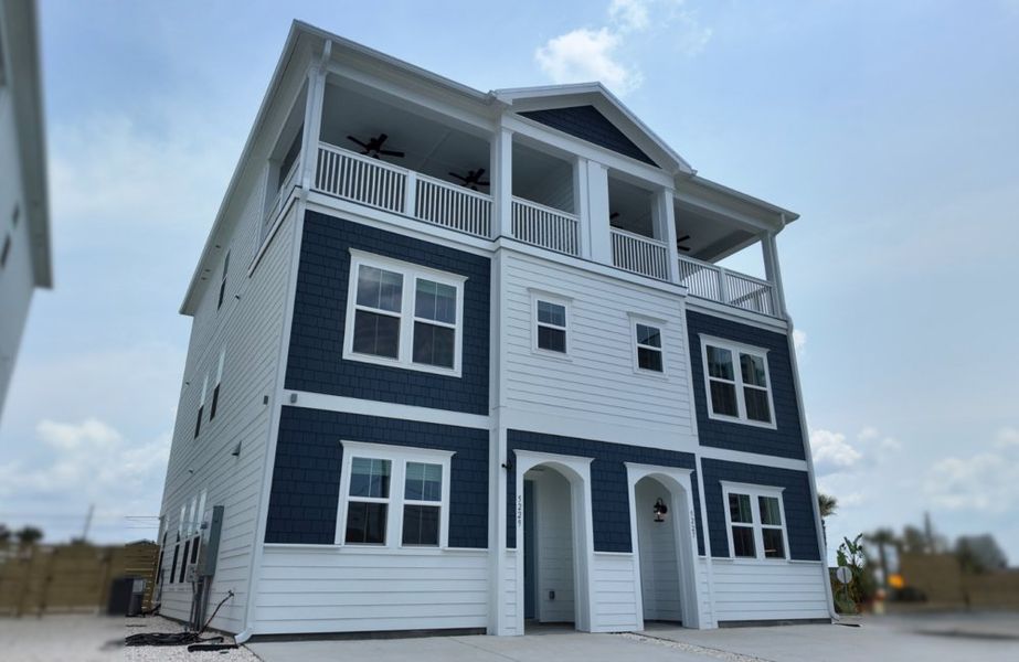 Front exterior of a home in the Thomas Drive community, located in Panama City Beach, FL (Image 1). Front exterior of a home in the Thomas Drive community, located in Panama City Beach, FL (Image 1).