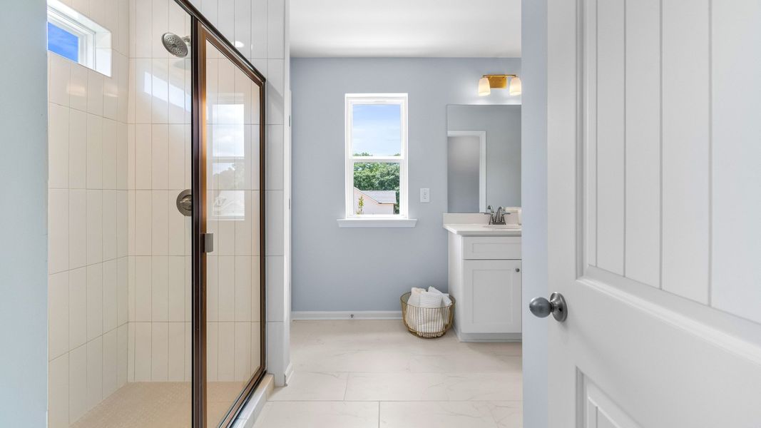 Furnished interior in a model home at McClure Farms Townhomes in Columbia (Image 16).