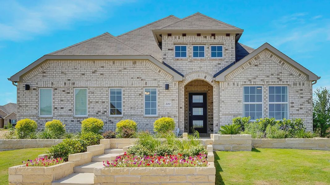 Distinctive brick facade and arched entrance embody elegance. Lush landscaping enhances the Hunters Glen allure. Distinctive brick facade and arched entrance embody elegance. Lush landscaping enhances the Hunters Glen allure.