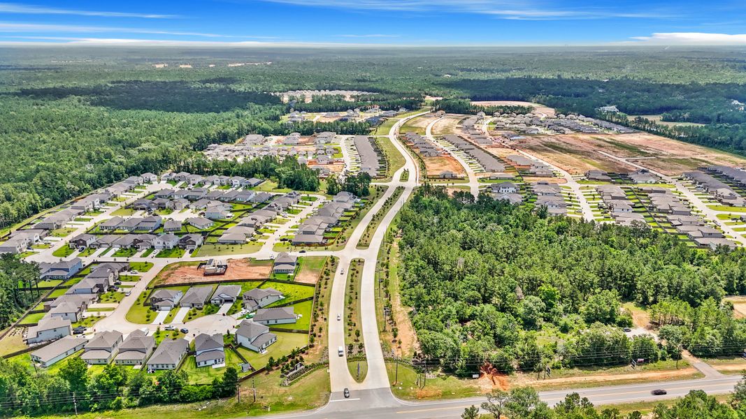 Aerial view of the Magnolia Springs community in Montgomery, TX, showing layout and nearby surroundings (Image 11).