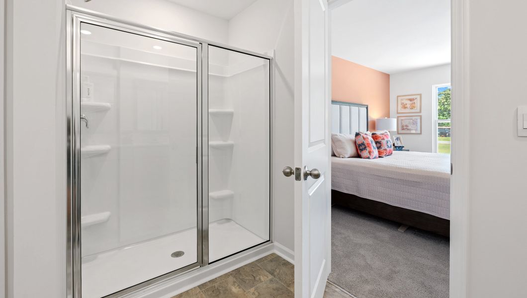 Furnished interior in a model home at Tanglewood Townes in Greenville (Image 23).