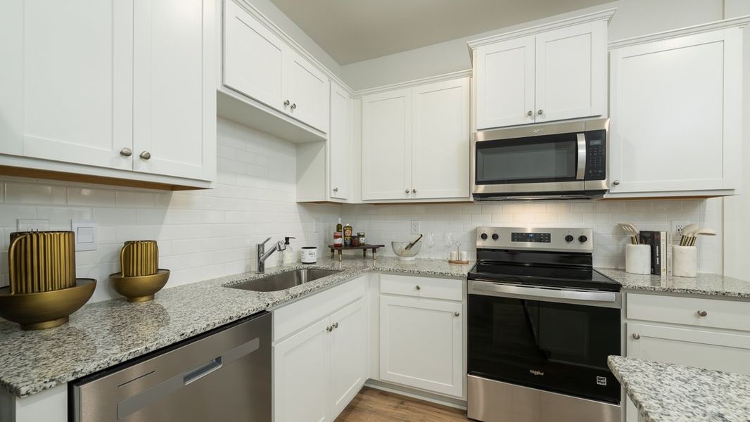 Furnished interior in a model home at Wellington Park in Lithonia (Image 13).