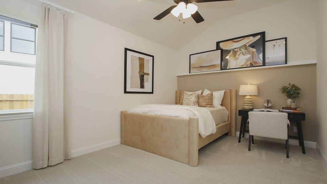 Experience refined comfort with plush textures and sleek art in this Woodlands Hills bedroom.