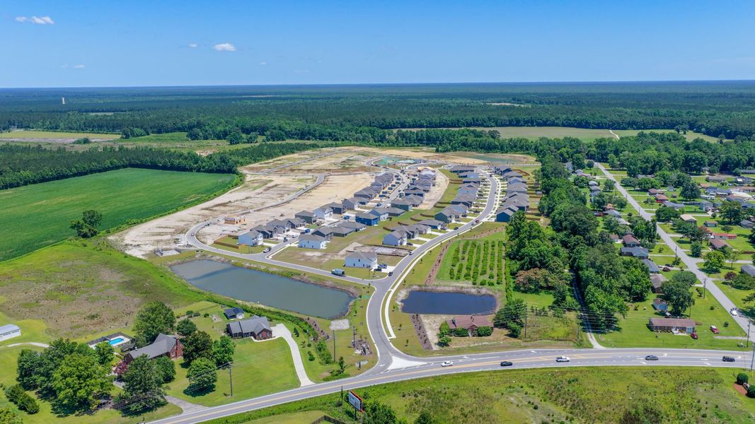 Aerial view of the Vineyard Trail community in Jacksonville, NC, showing layout and nearby surroundings (Image 13). Aerial view of the Vineyard Trail community in Jacksonville, NC, showing layout and nearby surroundings (Image 13).