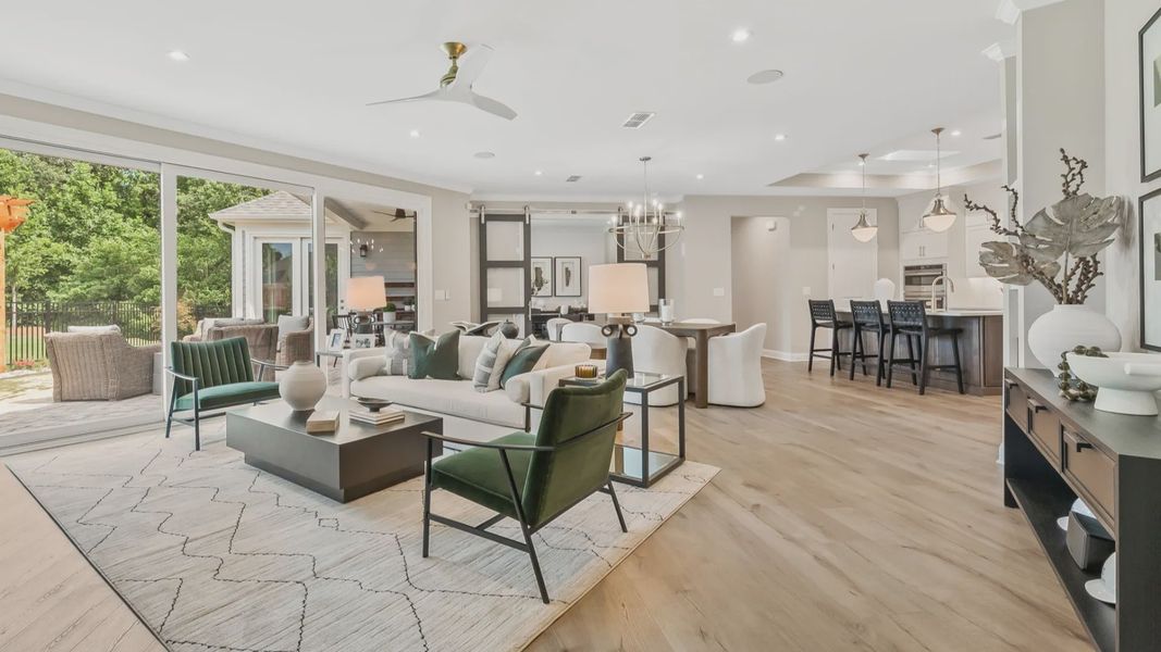 Furnished interior in a model home at The Courtyards at Post Road in Cumming (Image 4).