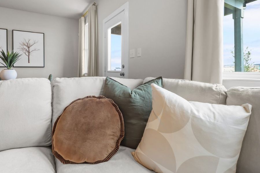 A couch with pillows. A couch with pillows.