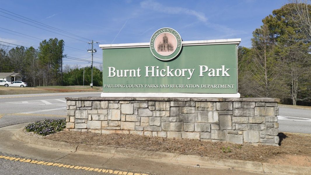 Entrance to the Aurora Creek community in Dallas, GA, featuring signage and landscaping (Image 14). Entrance to the Aurora Creek community in Dallas, GA, featuring signage and landscaping (Image 14).