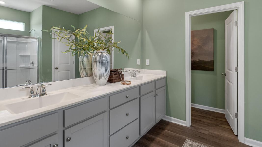 Furnished interior in a model home at Grayson Park in Leland (Image 17).