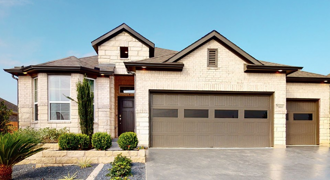 Front exterior of a home in the Water Oak community, located in Georgetown, TX (Image 4).