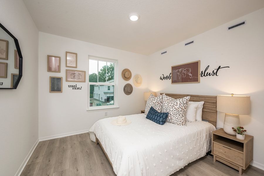 Furnished interior in a model home at Towns at Greenleaf in Oviedo (Image 9).