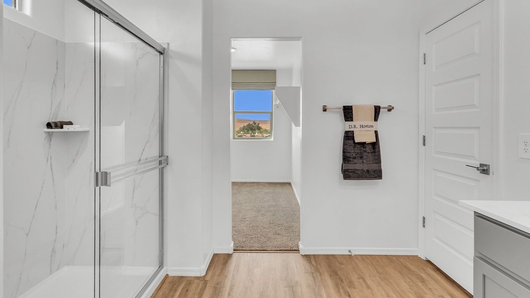 Furnished interior in a model home at Coronet at Gladden Farms in Marana (Image 71).