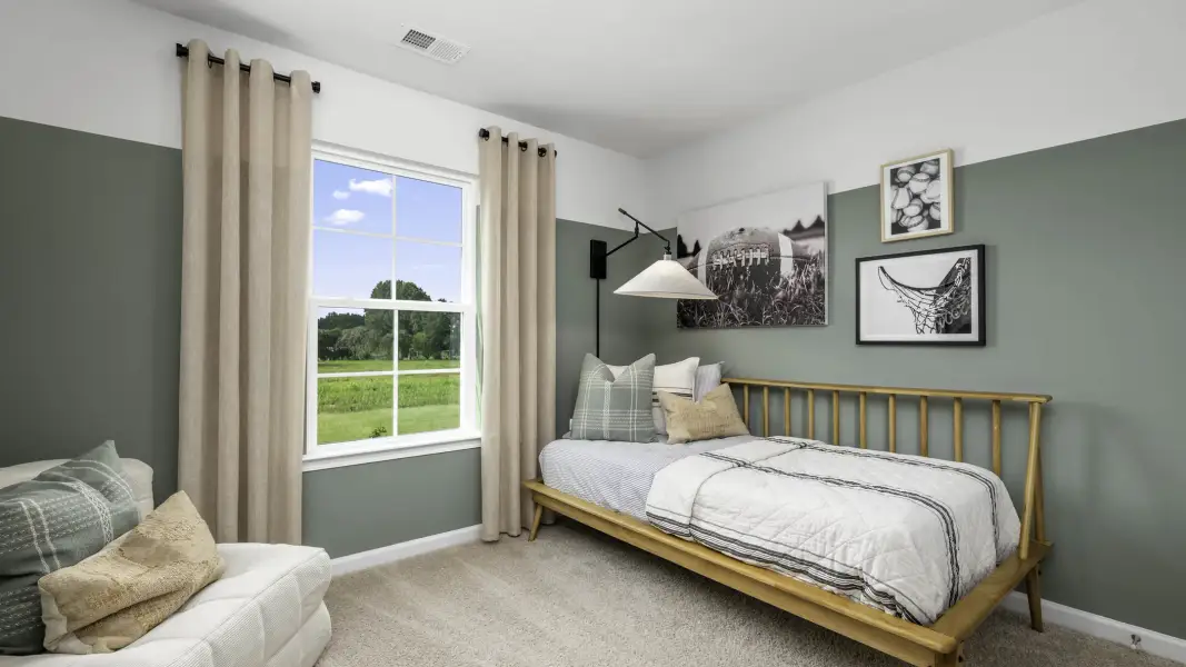 Furnished interior in a model home at Parker Trace in Mocksville (Image 6).
