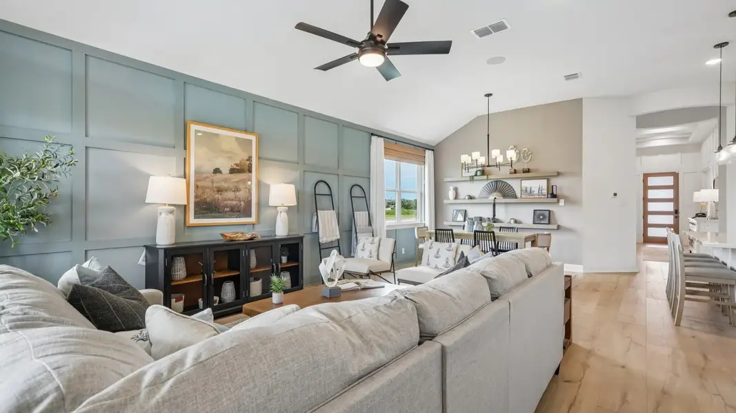 Open and airy great room seamlessly flowing into the dining area and kitchen with abundant natural light Open and airy great room seamlessly flowing into the dining area and kitchen with abundant natural light