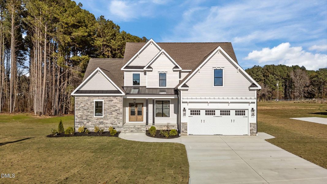 Front exterior of a home in the Lassiter Road community, located in Four Oaks, NC (Image 3).
