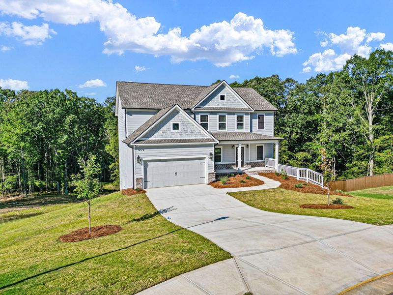 Front exterior of a home in the Woodland Hills community, located in Loganville, GA (Image 15). Front exterior of a home in the Woodland Hills community, located in Loganville, GA (Image 15).