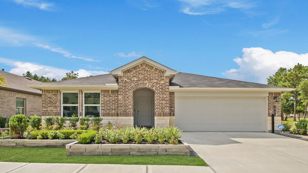 Front exterior of a home in the Porters Mill community, located in New Caney, TX (Image 3).