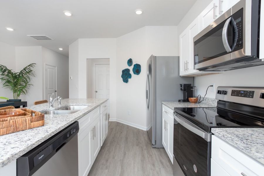 Furnished interior in a model home at Trinity Townes in Trinity (Image 6).
