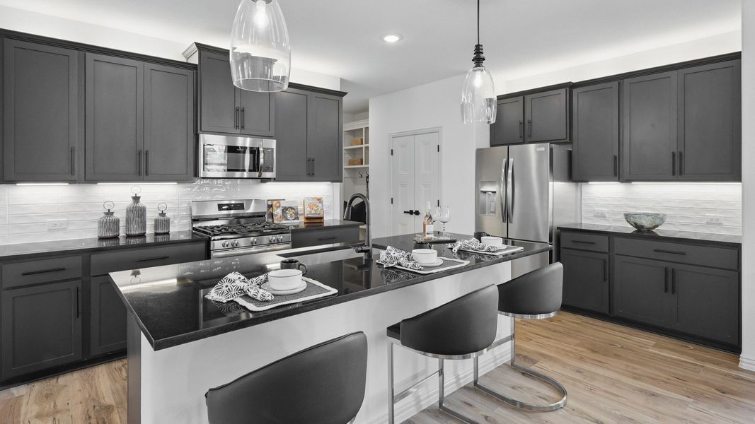 Furnished interior in a model home at Westridge Journey in McKinney (Image 14).