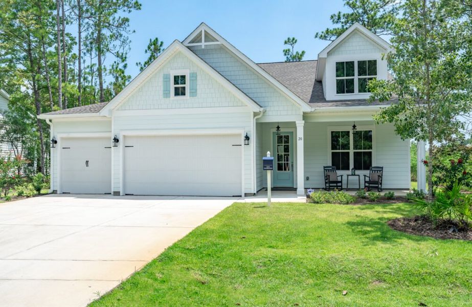 Front exterior of a home in the Magnolia Bay Estates community, located in Freeport, FL (Image 2).