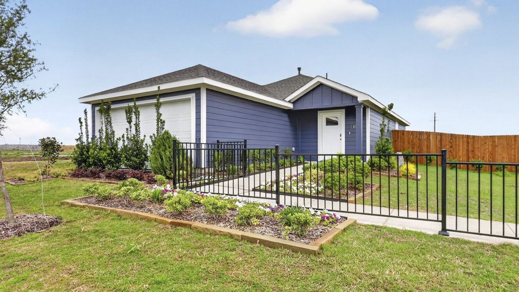 Front exterior of a home in the The Hills of Sherman community, located in Sherman, TX (Image 9).