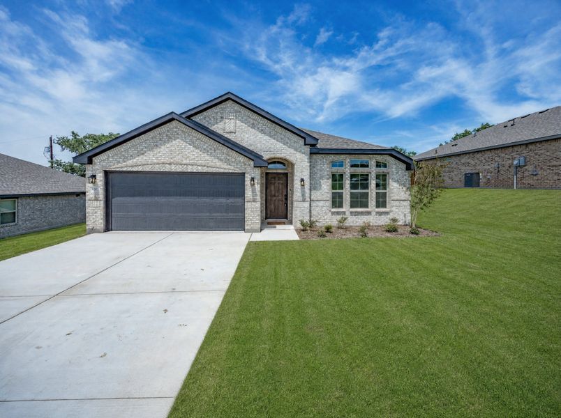 Front exterior of a home in the Pitcock Addition community, located in Graham, TX (Image 2). Front exterior of a home in the Pitcock Addition community, located in Graham, TX (Image 2).
