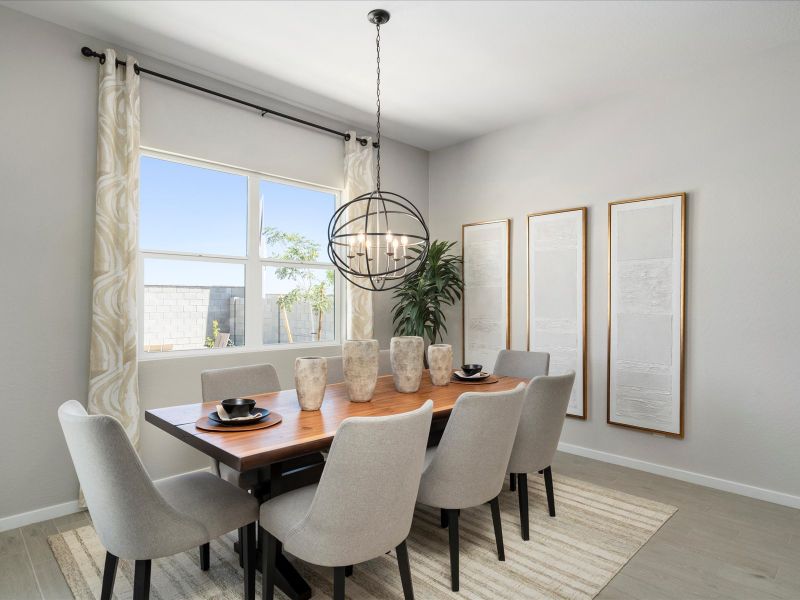 Furnished interior in a model home at White Tank Foothills Signature Series in Waddell (Image 9).